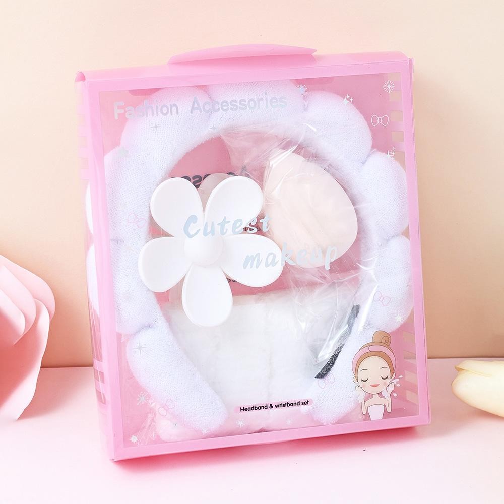 Terry Cloth Headband & Wristband Set Set Includes: - Terry Cloth Headband - Wristbands - Makeup Sponge - Flower Hair Clip view 2