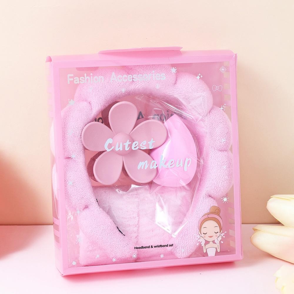 Terry Cloth Headband & Wristband Set Set Includes: - Terry Cloth Headband - Wristbands - Makeup Sponge - Flower Hair Clip view 2