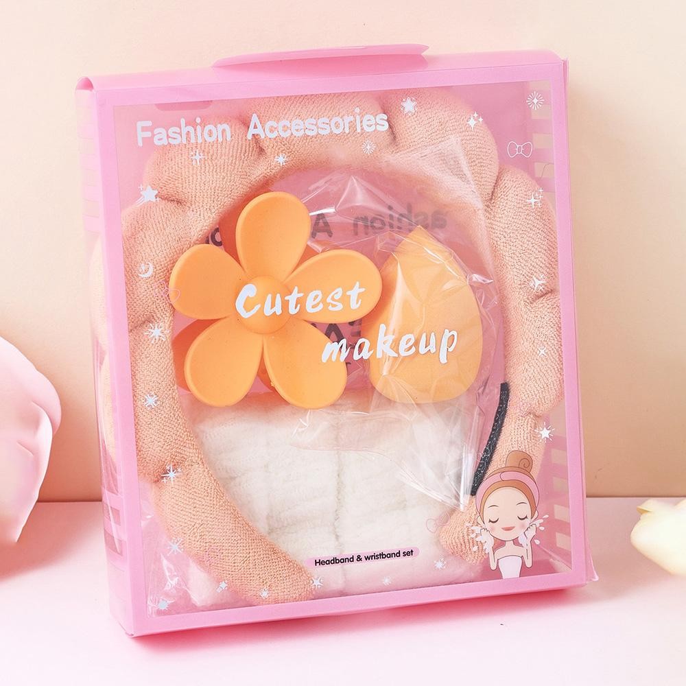Terry Cloth Headband & Wristband Set Set Includes: - Terry Cloth Headband - Wristbands - Makeup Sponge - Flower Hair Clip view 2