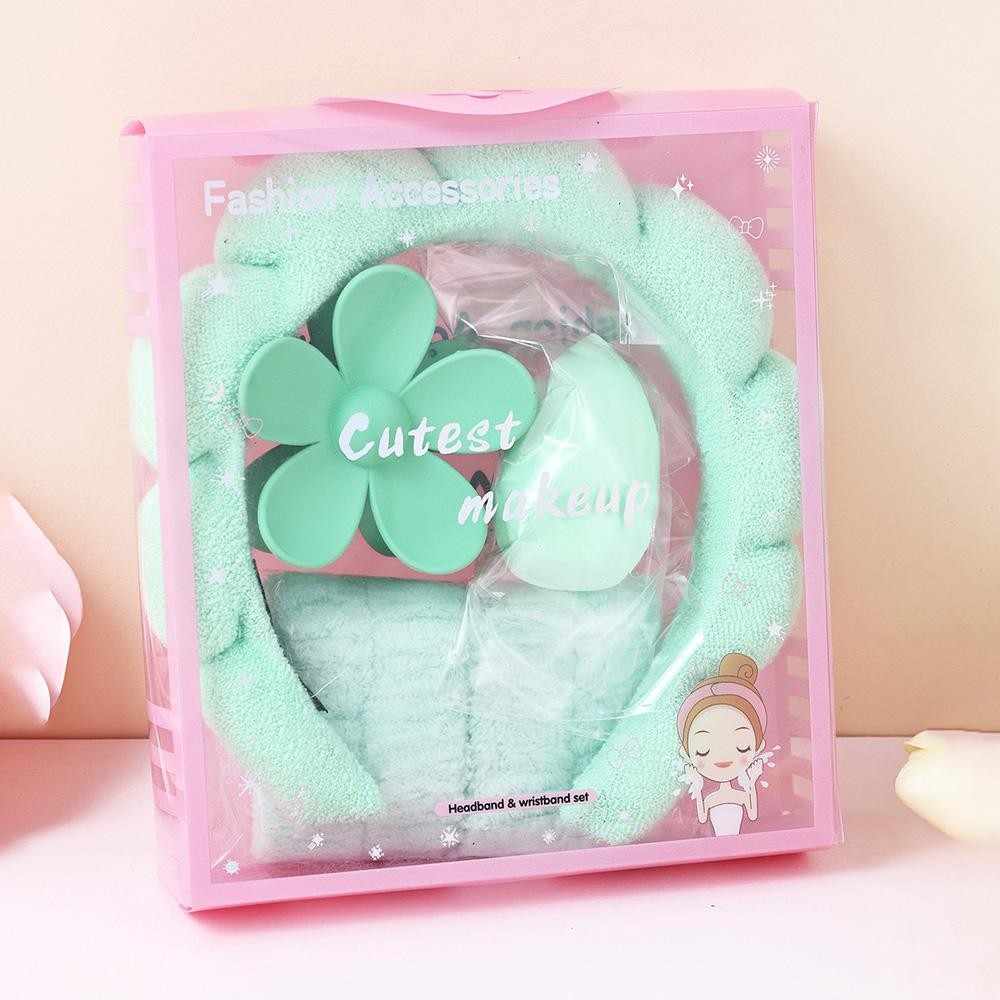 Terry Cloth Headband & Wristband Set Set Includes: - Terry Cloth Headband - Wristbands - Makeup Sponge - Flower Hair Clip view 2