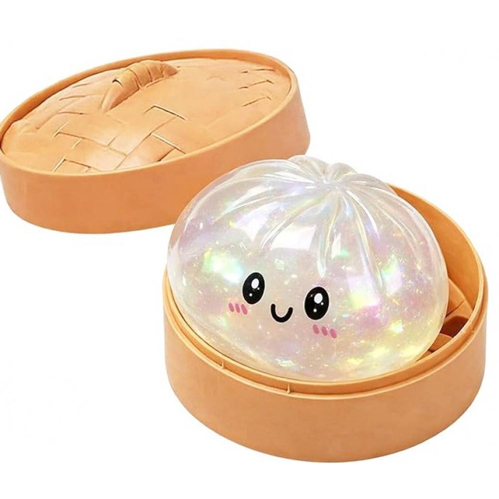 Dumpling Squishy Toy Cute novelty squishy toy designed as a smiling dumpling in a bamboo-style steamer. Perfect for gifts, impulse buys, and food-themed novelty displays. - Ages 3+ - Approximately 3" L view 2
