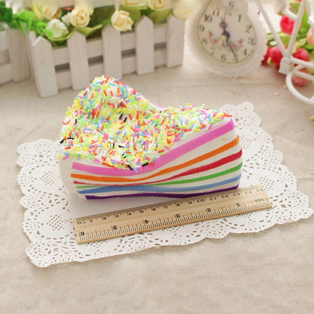 Cake Slice Squishy Toy Sweet novelty squishy toy designed as a layered cake slice. - Ages 3+ - Approximately 4.75" L view 4