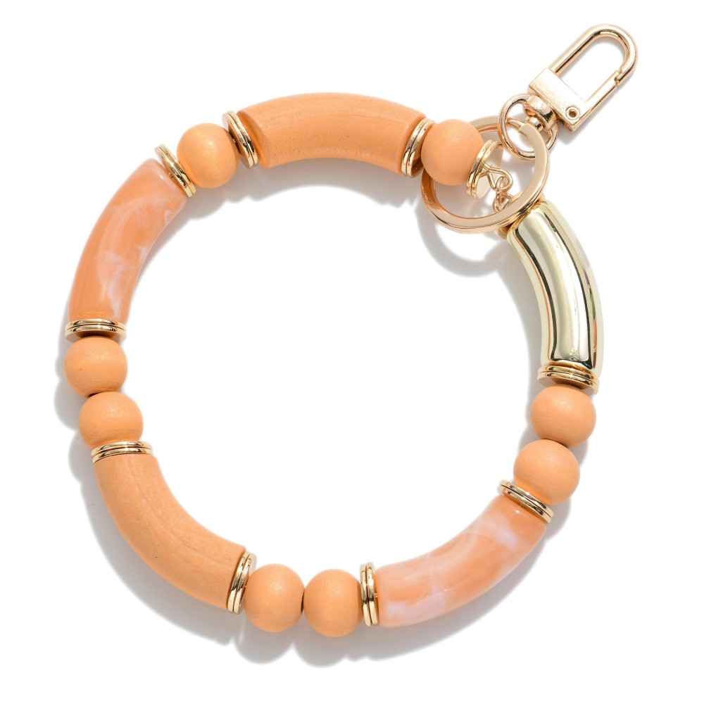 Acrylic Tube Keyring Featuring Wooden Beads and Gold Accents - Approximately 3" Diameter view 2