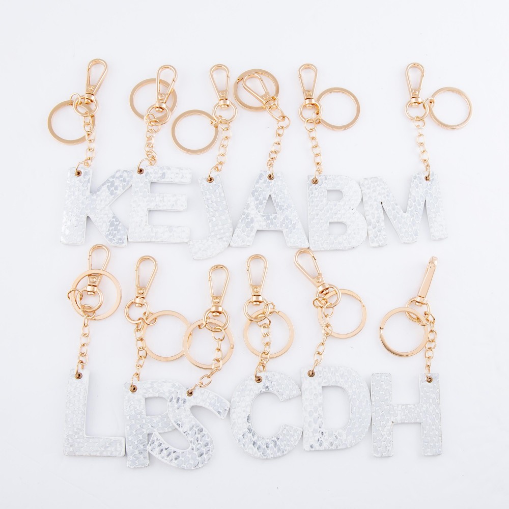 White Metallic Faux Leather Snakeskin Initial KeyChain. - Initial approximately 2" - Approximately 5" L view 4