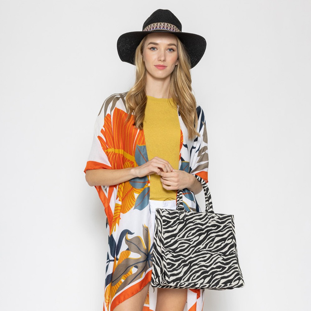 Zebra Print Structured Handbag - Inside Pocket - Magnetic Snap Closure - 100% Polyester (Outside) / 100% Polyurethane (Lining) - Approximately 6" Drop In Handles - Approximately 14" Wide X 12" Tall view 2