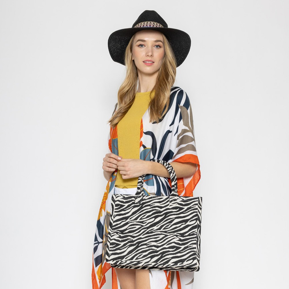 Zebra Print Structured Handbag - Inside Pocket - Magnetic Snap Closure - 100% Polyester (Outside) / 100% Polyurethane (Lining) - Approximately 6" Drop In Handles - Approximately 14" Wide X 12" Tall view 4