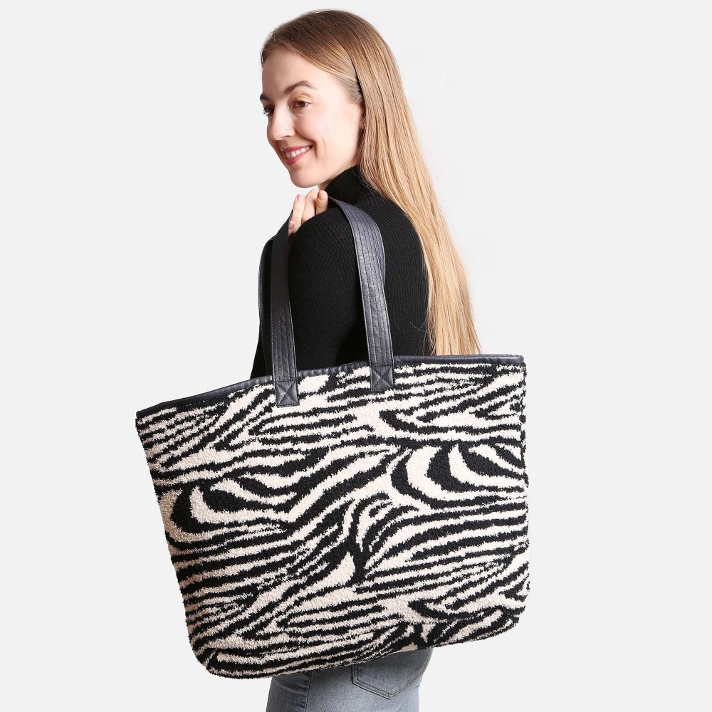 ComfyLuxe Zebra Print Knit Tote Bag - Lined - Magnetic Closure - Two Internal Pockets - Approximately 20" H x 40" W - Handle Approximately 10" Drop - 100% Poly Microfiber view 2