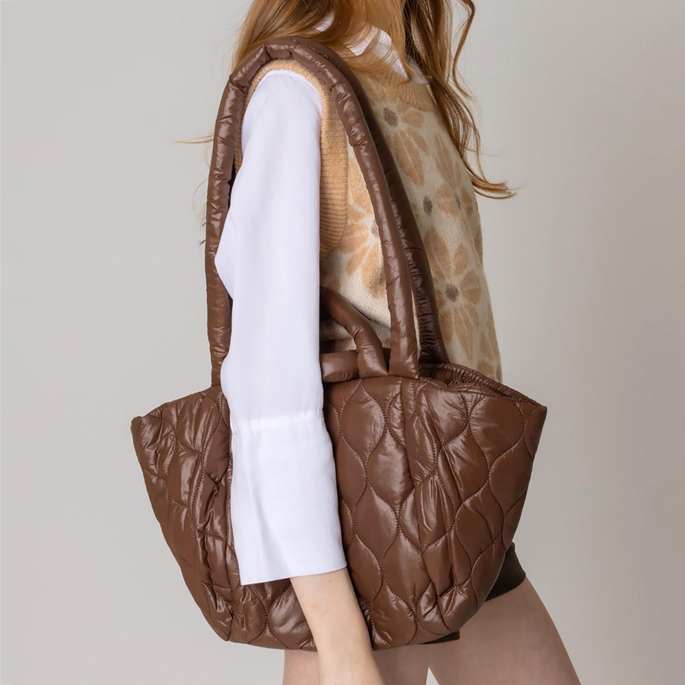 Puffy Quilt Tote Bag With Handles and Drop Straps. - Magnetic Closure - One Inner Pocket - One Outer Pocket With Magnetic Closure - Approximately 14" L x 11" T x 5" W - Strap Drop 13" L - 100% Polyester view 2