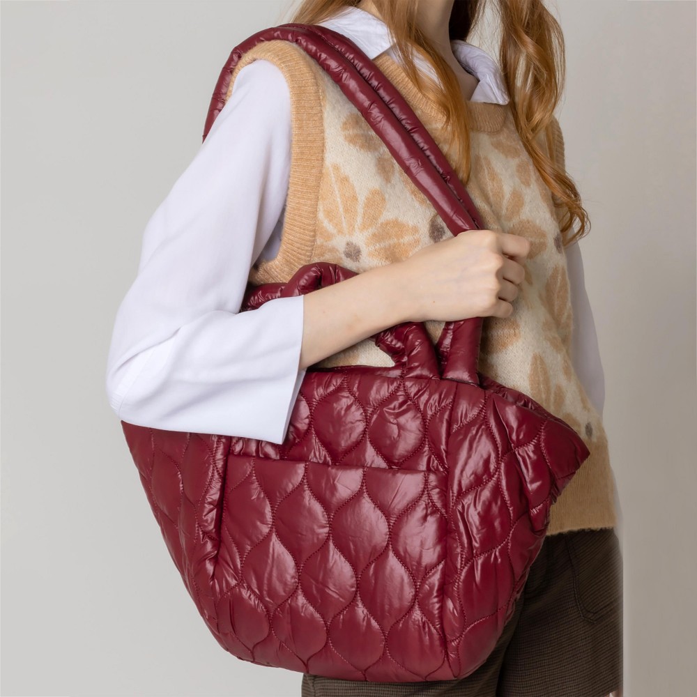 Puffy Quilt Tote Bag With Handles and Drop Straps. - Magnetic Closure - One Inner Pocket - One Outer Pocket With Magnetic Closure - Approximately 14" L x 11" T x 5" W - Strap Drop 13" L - 100% Polyester view 2