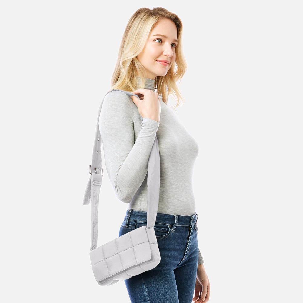 Puffy Quilt Stitch Cross Body Handbag With Adjustable Buckle Strap - Magnetic Flap Closure - Two Inner Pockets: One Zipper Closure / One Open - Approximately 9" L x 4.5" T x 2.5" D - Strap Drop Adjustable 14" - 22" L view 2