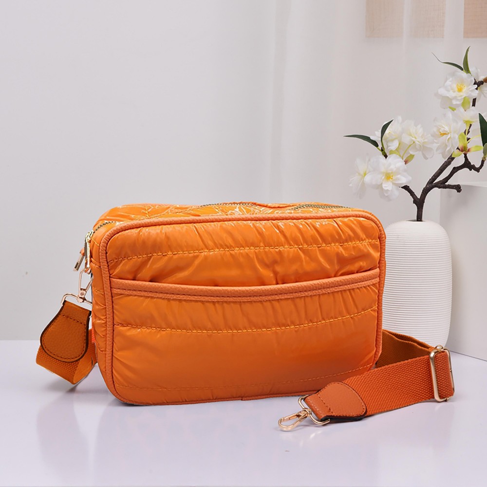 Horizontal Puffer Crossbody Bag - Full Zipper Closure - Lined Body With Leather Edged Internal Pocket - Open Front Pocket - Removable/Adjustable Strap - Strap Drop Approximately 13-26" L - Body 9.5" W X 6" T X 2.5" D view 2