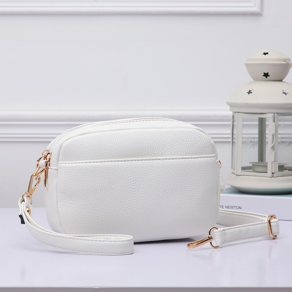 Faux Leather Double Zipper Crossbody Bag - Two Zipper Main Body Pockets With One Internal Zipper Pocket - Magnetic Closure Front Pocket - Removable Wristlet Strap Included - Removable / Adjustable Cross Body Strap - Approximately 8" W X 5.25" T X 3" D - Adjustable 28-48" L view 2