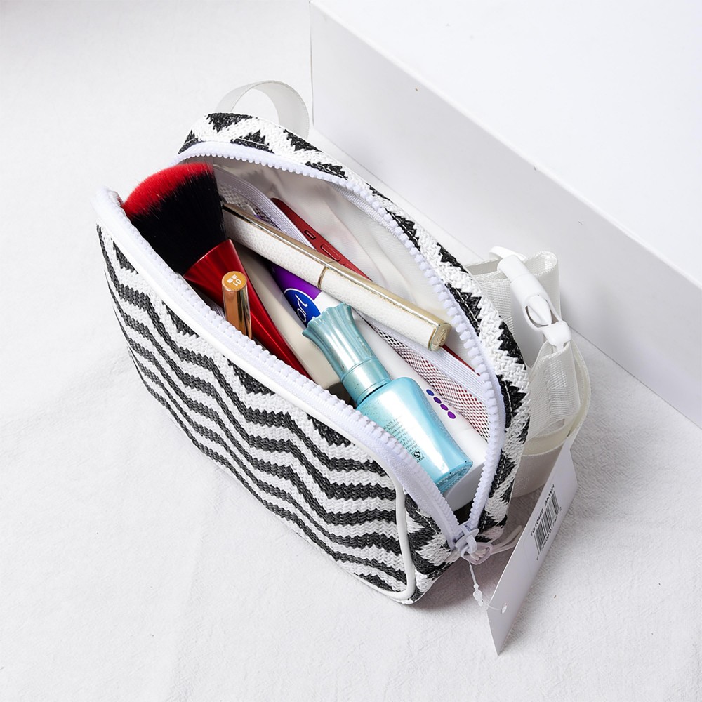 Zig-Zag Straw Sling Belt Bag Featuring Leather Trim - Adjustable Buckle Cross Body Strap - Full Zip Closure - Lined - Three Inner Mesh Pockets - Approximately 8"W x 5.5"H x 2.5"D view 6