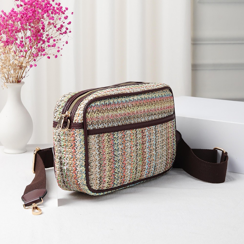 Straw Cross Body Handbag Featuring Leather Trim With Detachable Nylon Strap - Zip Closure - One Outer Pocket - Two Inner Pockets: One Zip - One Open - Approximately 10" L x 6.5" T x 2.5" W - Strap Drop 15" - 24" L view 4
