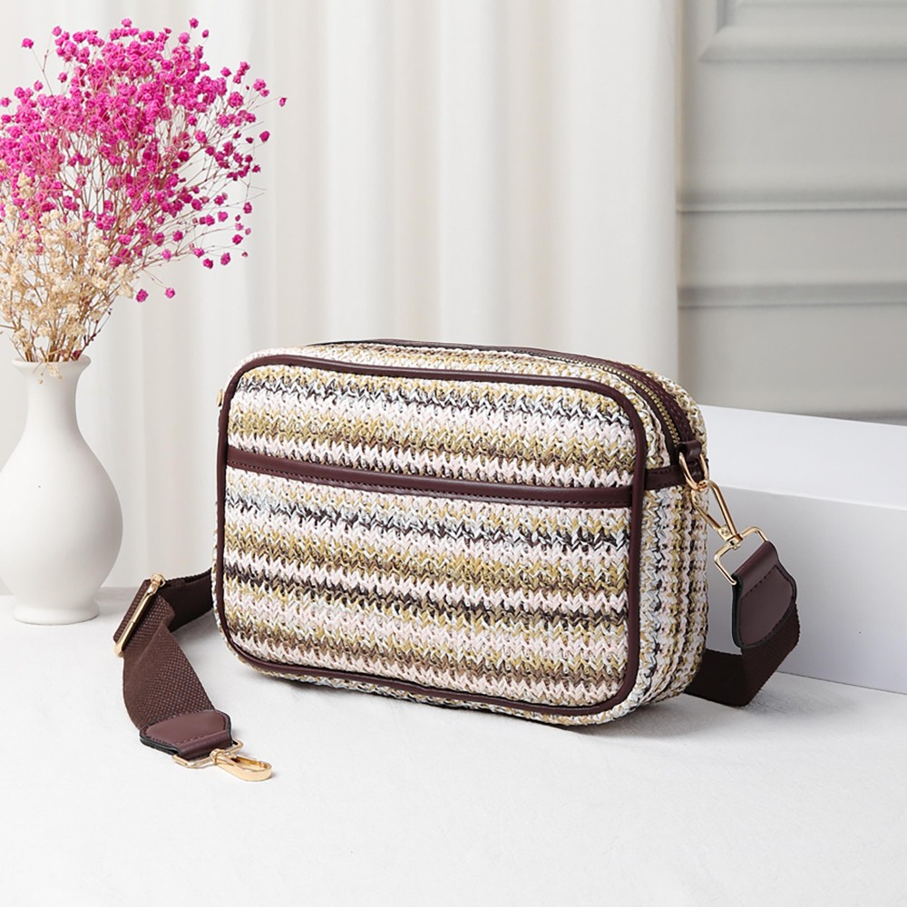 Straw Cross Body Handbag Featuring Leather Trim With Detachable Nylon Strap - Zip Closure - One Outer Pocket - Two Inner Pockets: One Zip - One Open - Approximately 10" L x 6.5" T x 2.5" W - Strap Drop 15" - 24" L view 2