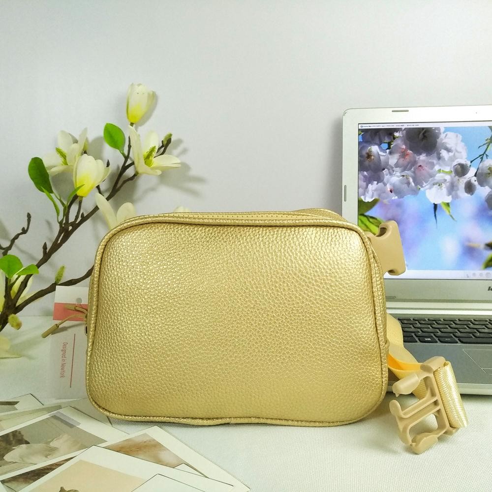 Cross Body Leather Belt Bag - Full Zip Closure - One Main Body Pocket With Two Inner Mesh Pockets - Lined Zipper Pocket On Back Of Bag - Adjustable Strap Approximately 20"-35" L - Approximately 8.5"L X 5.5"T X 3"W view 2