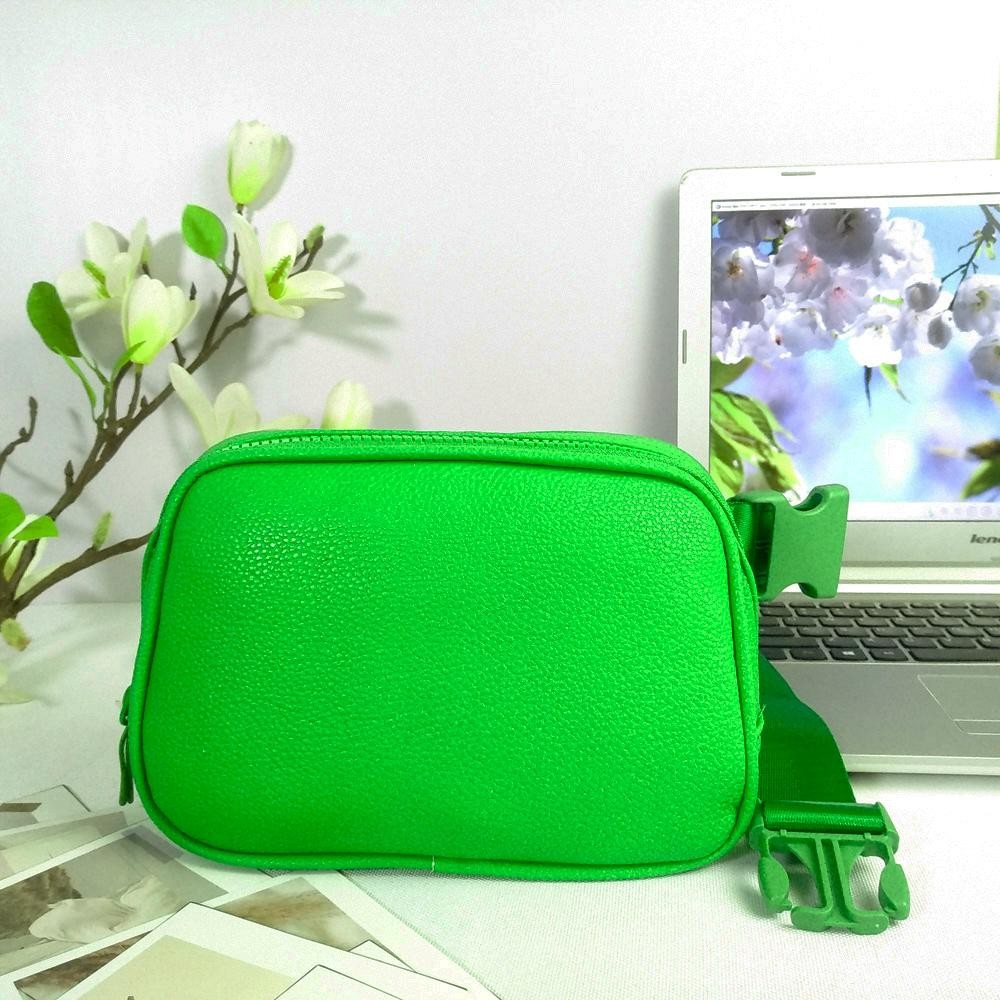 Cross Body Leather Belt Bag - Full Zip Closure - One Main Body Pocket With Two Inner Mesh Pockets - Lined Zipper Pocket On Back Of Bag - Adjustable Strap Approximately 20"-35" L - Approximately 8.5"L X 5.5"T X 3"W view 2