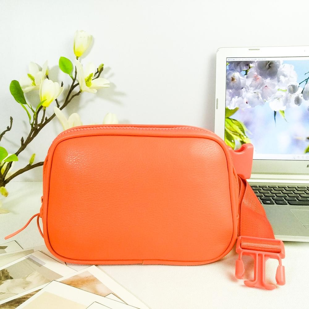 Cross Body Leather Belt Bag - Full Zip Closure - One Main Body Pocket With Two Inner Mesh Pockets - Lined Zipper Pocket On Back Of Bag - Adjustable Strap Approximately 20"-35" L - Approximately 8.5"L X 5.5"T X 3"W view 2