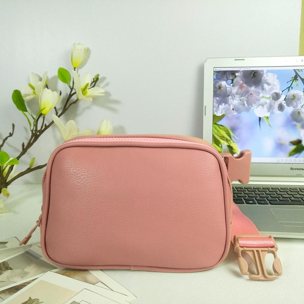 Cross Body Leather Belt Bag - Full Zip Closure - One Main Body Pocket With Two Inner Mesh Pockets - Lined Zipper Pocket On Back Of Bag - Adjustable Strap Approximately 20"-35" L - Approximately 8.5"L X 5.5"T X 3"W view 2