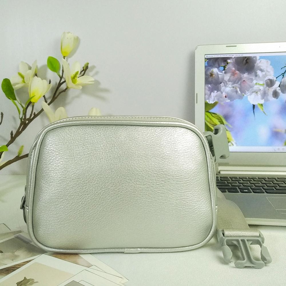 Cross Body Leather Belt Bag - Full Zip Closure - One Main Body Pocket With Two Inner Mesh Pockets - Lined Zipper Pocket On Back Of Bag - Adjustable Strap Approximately 20"-35" L - Approximately 8.5"L X 5.5"T X 3"W view 2