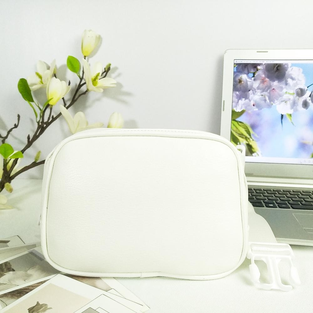 Cross Body Leather Belt Bag - Full Zip Closure - One Main Body Pocket With Two Inner Mesh Pockets - Lined Zipper Pocket On Back Of Bag - Adjustable Strap Approximately 20"-35" L - Approximately 8.5"L X 5.5"T X 3"W view 2