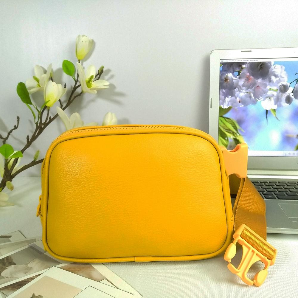 Cross Body Leather Belt Bag - Full Zip Closure - One Main Body Pocket With Two Inner Mesh Pockets - Lined Zipper Pocket On Back Of Bag - Adjustable Strap Approximately 20"-35" L - Approximately 8.5"L X 5.5"T X 3"W view 2