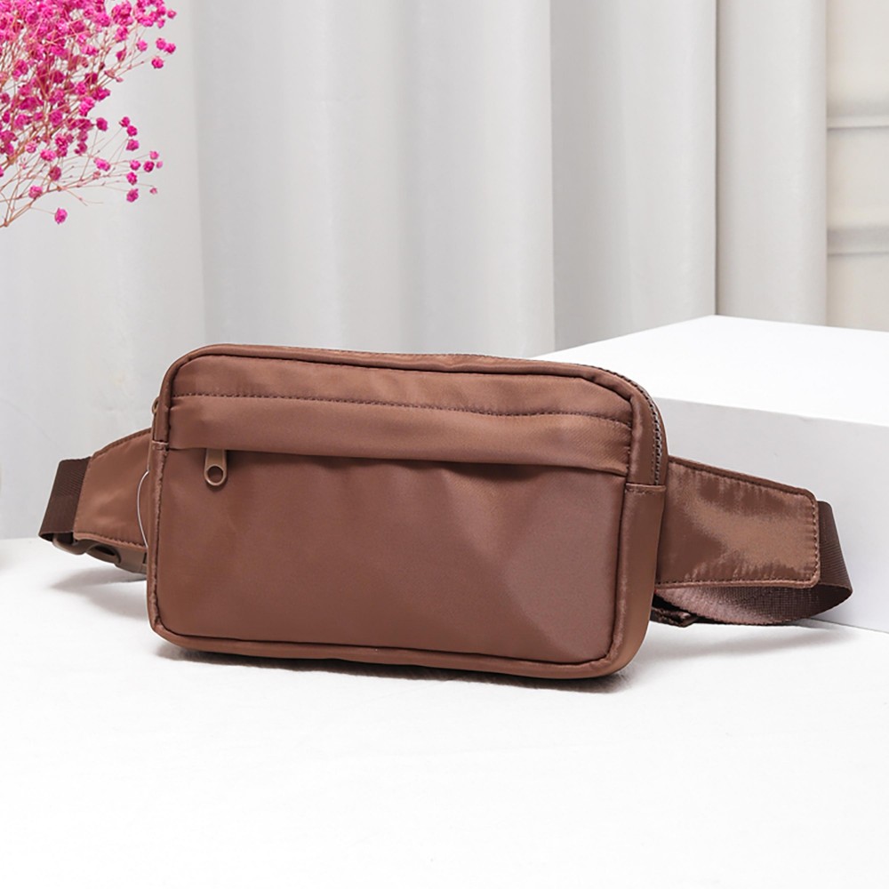 Nylon Belt Bag With Covered Front Zipper - Full Zipper Closure - Zip Pocket on Back - Adjustable Strap - Approximately 9"W X 5.5" T X 1" D view 2