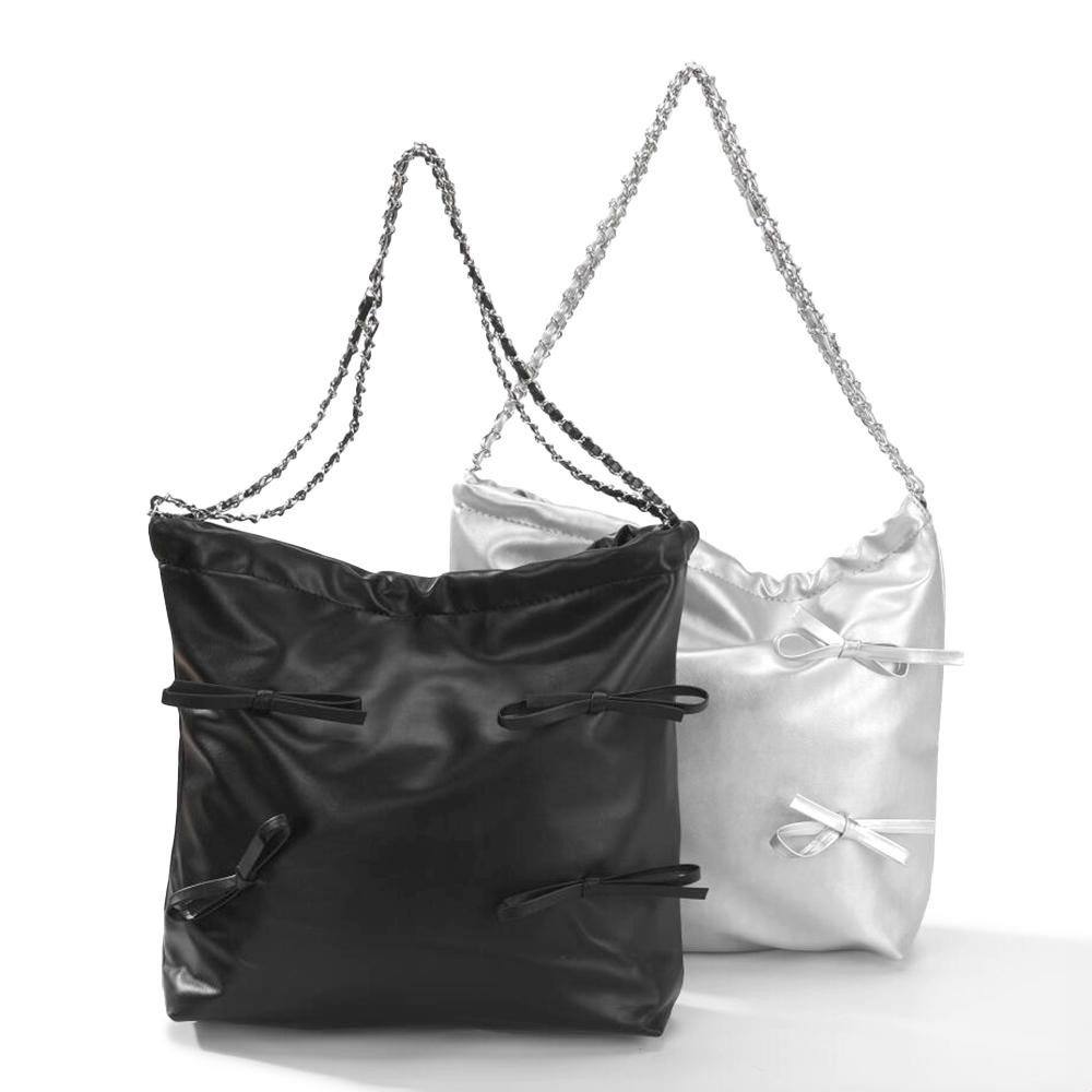 Vegan Leather Shoulder Tote Bag Featuring Bow Details & Chain Link Straps - Magnetic Snap Closure - Lined Body - One Internal Open Pocket - Strap Drop 10" L - Approximately 12" W X 10" H X 4" D view 4