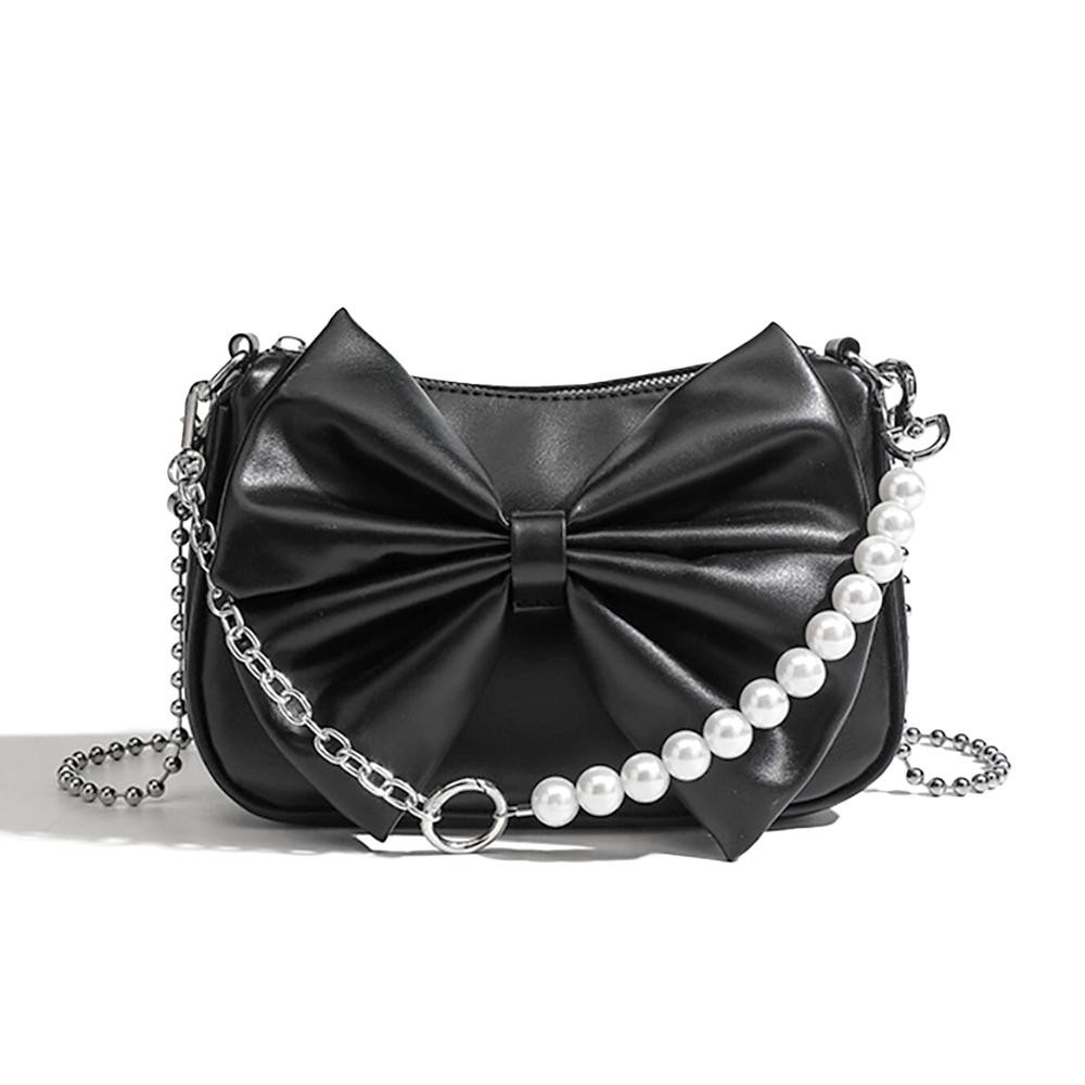 Vegan Leather Bow Cross Body Bag - Full Zipper Closure - Lined Interior With Zipper Pocket - Removable Ball Chain Strap (22"L) - Removable Pearl/Chain Clutch Strap - Approximately 8.5"W X 5.5"T X 2.5"D view 2