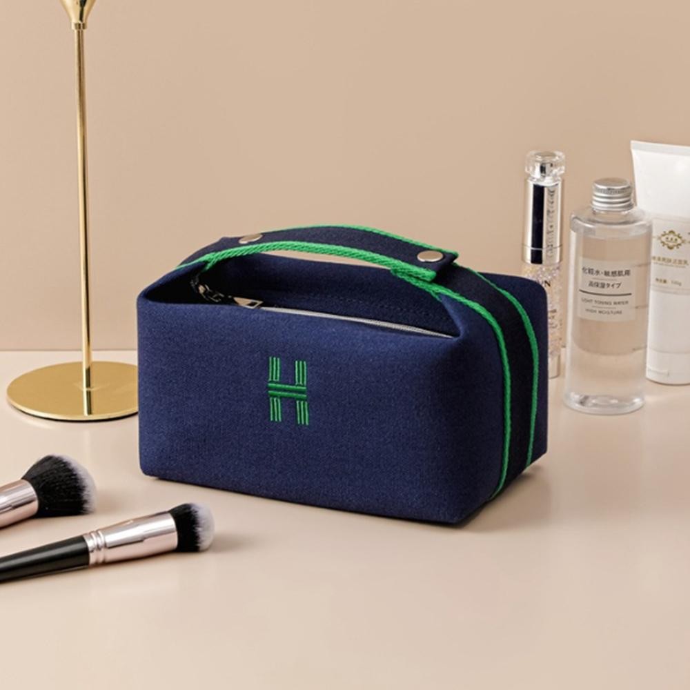 Lined Canvas Makeup Bag With Button Snap Handle - Zip Closure - Lined Inside With Four Pockets - Approximately 8" L x 5" T x 4.5" D view 2
