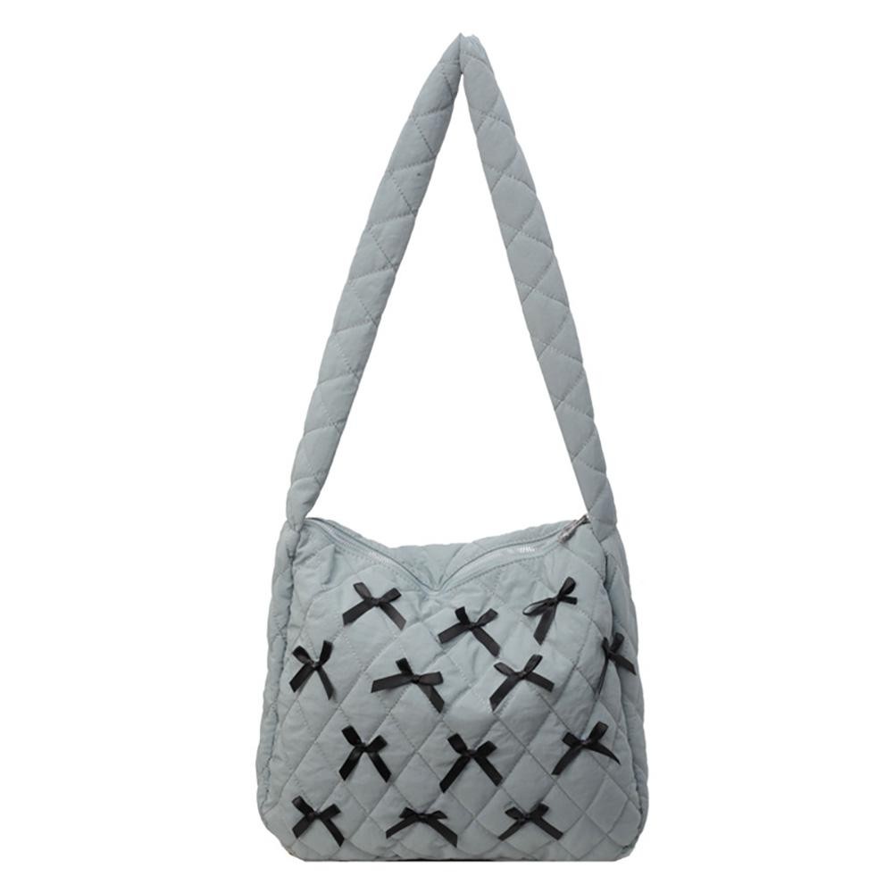 Quilted Nylon Cross Body Bag With Bow Details - Full Zipper Closure - Lined Body - One Internal Zipper Pocket - Approximately 14" L X 13" T X 3" D - Strap Drop 15" L view 2