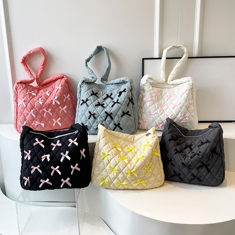 Quilted Nylon Cross Body Bag With Bow Details - Full Zipper Closure - Lined Body - One Internal Zipper Pocket - Approximately 14" L X 13" T X 3" D - Strap Drop 15" L view 4