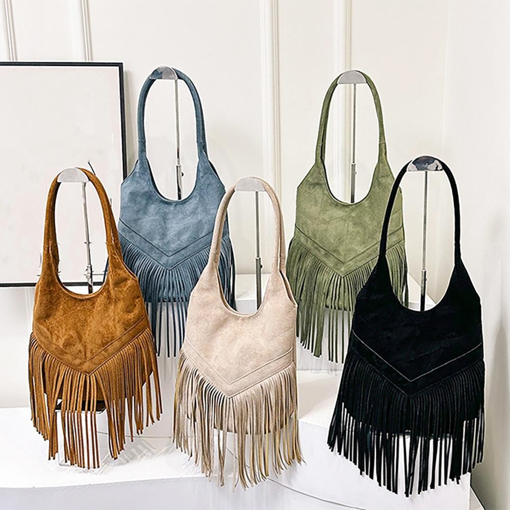 Vegan Suede Tassel Fringe Tote Bag Featuring Chevron Stitched Detail - Magnetic Snap Closure - Lined Inside - Open Inside With One Zip Pocket - Approximately 13" T x 12" L x 1" W - Handle Drop 12" L view 4