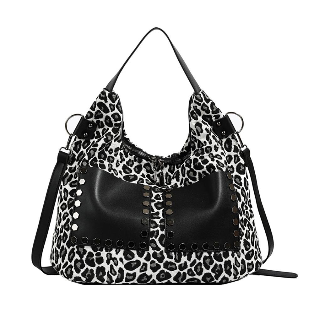 Leopard Print Cross Body Tote Bag With Vegan Leather & Stud Details - Two External Open Pockets - Full Zipper Closure - Lined Body - Two Internal Pockets: One Open & One Zip - One Back Zipper Pocket - Removable Cross Body Strap 36"- 41" L - Handle 9" L view 2