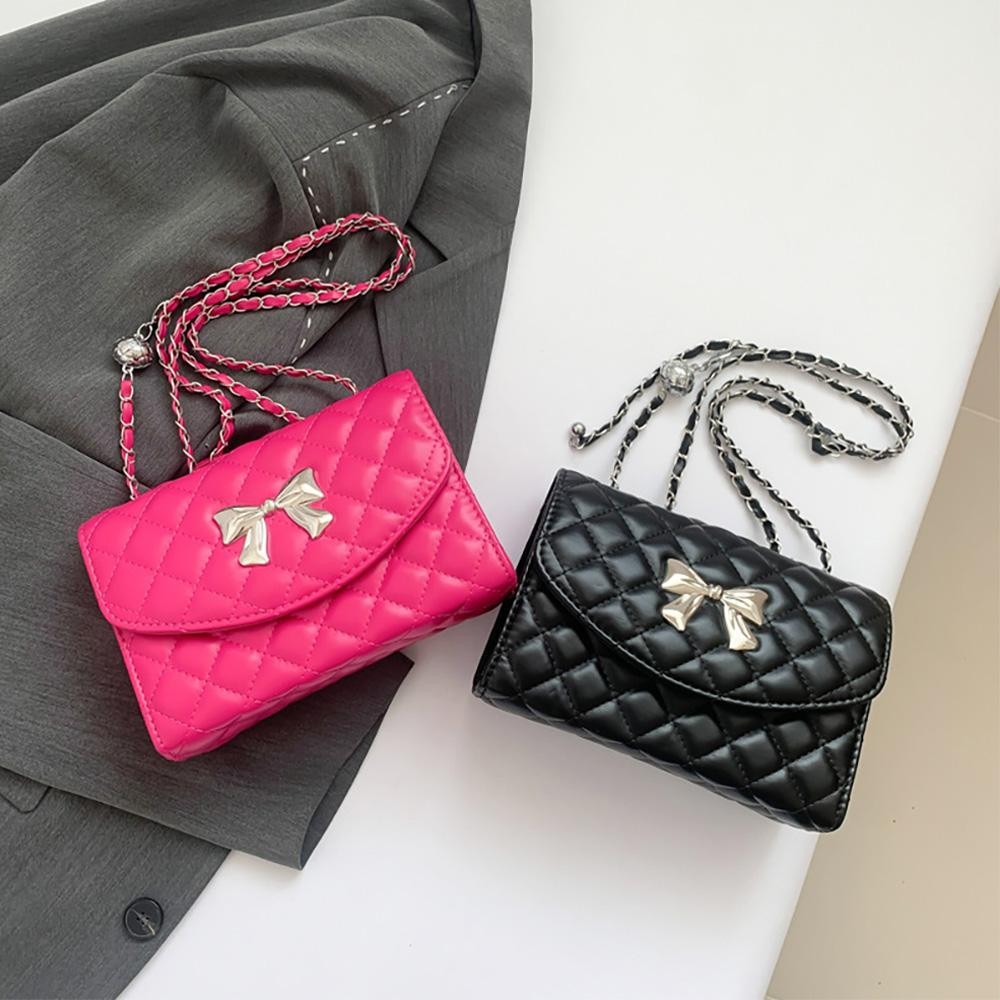 Vegan Leather Quilted Cross Body Tote Bag Featuring Metal Bow Detail - Magnetic Snap Closure - Chain Link Strap Drop 10"-20" L - Approximately 6" T X 8" L X 3" D view 4