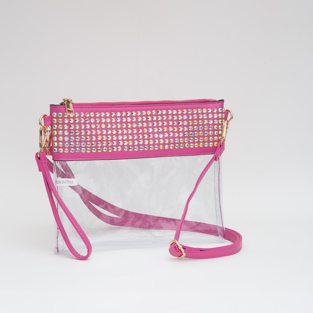 Clear Wristlet With Vegan Leather Trim & Rhinestone Stud Details - Zip Closure - Removeable Wristlet 20"-38" L - Removable Vegan Leather Crossbody Strap - Approximately 9" L X 8" T view 2