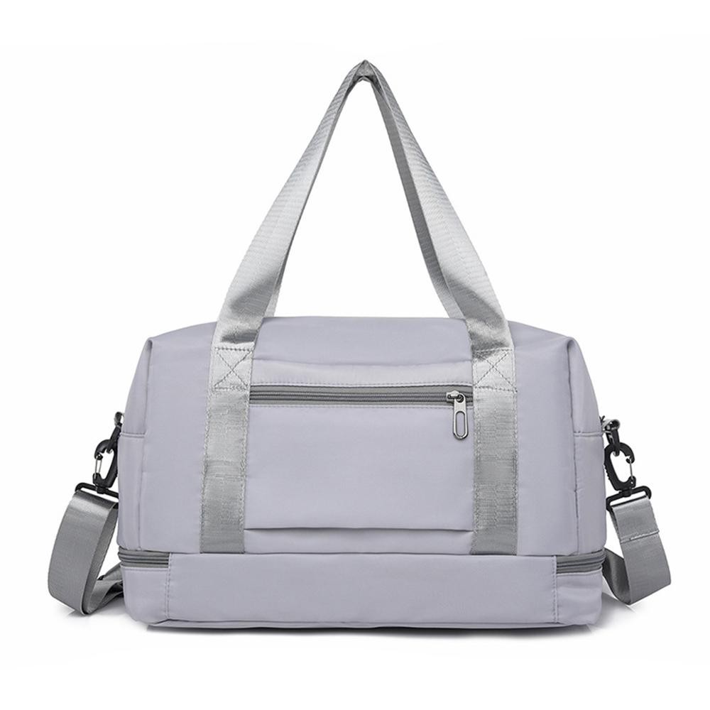 Nylon Duffle Tote Bag - Full Zip Closure - Lined Body - 2 External Zip Pockets - Full Zip Drop Bottom Compartment - 2 Internal Mesh Open Pockets & 1 Internal Open Pocket - Removeable Cross Body Strap - Approximately 10" T X 16" L X 7" D view 2