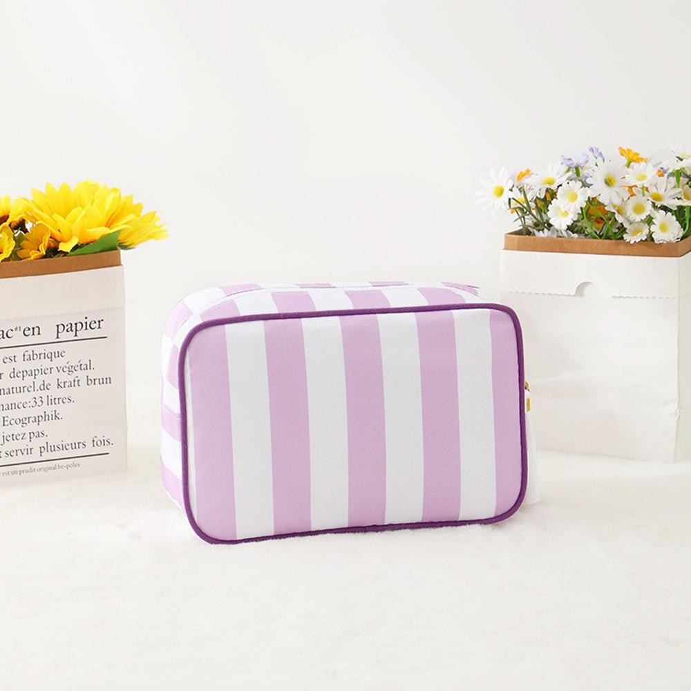Striped Nylon Padded Pouch With Tassels - Full Zip Closure - Lined Body - Approximately 9.25" L X 6.25" T X 2.5" D view 2