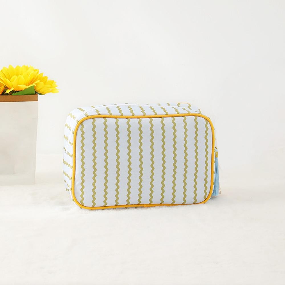 Nylon Curved Stripe Pouch With Tassel - Fill Zip Closure - Lined Body with Open Pocket - Approximately 9" L X 6" T X 3" D view 2