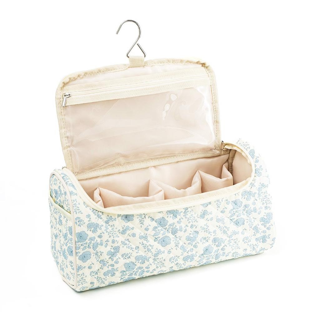 Quilted Floral Toiletry Bag - Full Zip Closure - 2 Open Side Pockets - Hook For Hanging - 1 Open Pocket - 1 Clear Zip Pocket - 4 Bottle Holders - Approximately 12" L X 6" T X 4" D view 2